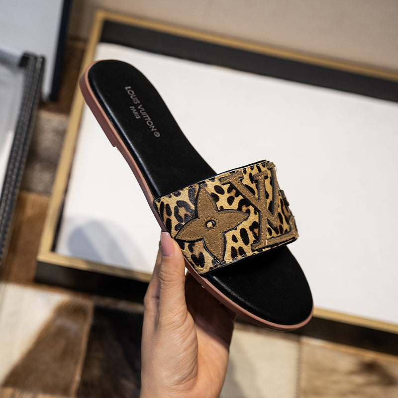 Louis Vuitton Lock It pony-style calfskin mules- SHOE